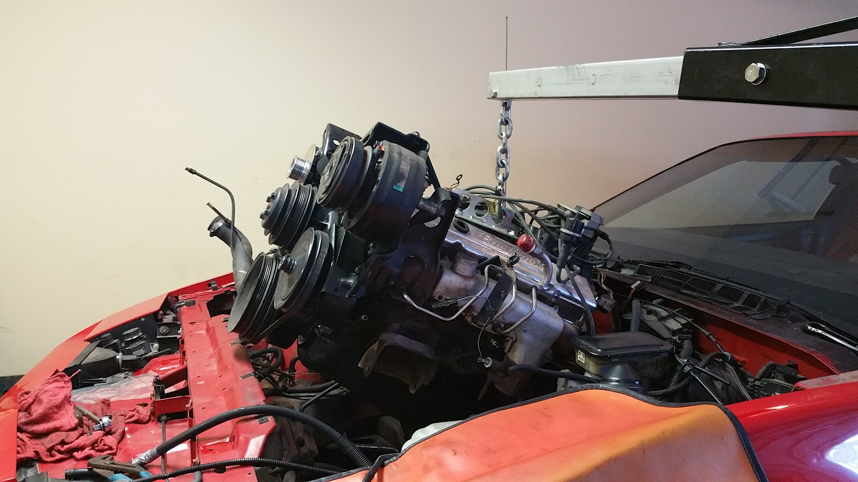 The original 305 coming out on the engine hoist